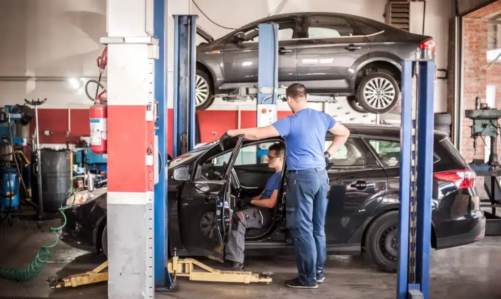 Interior of an auto repair shop showing leadership in the automotive set-up.