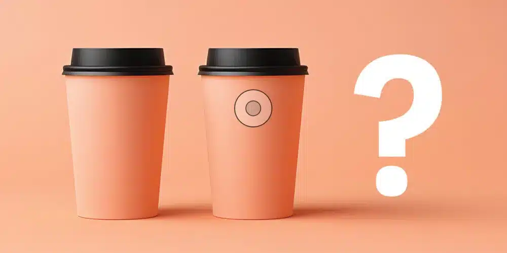 Two peach-colored coffee cups with black lids, one with a small circle design, next to a large white question mark on a peach background.